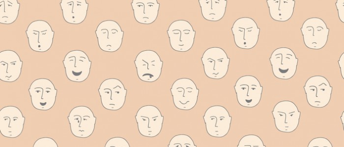 Cute seamless pattern with different facial expressions made in